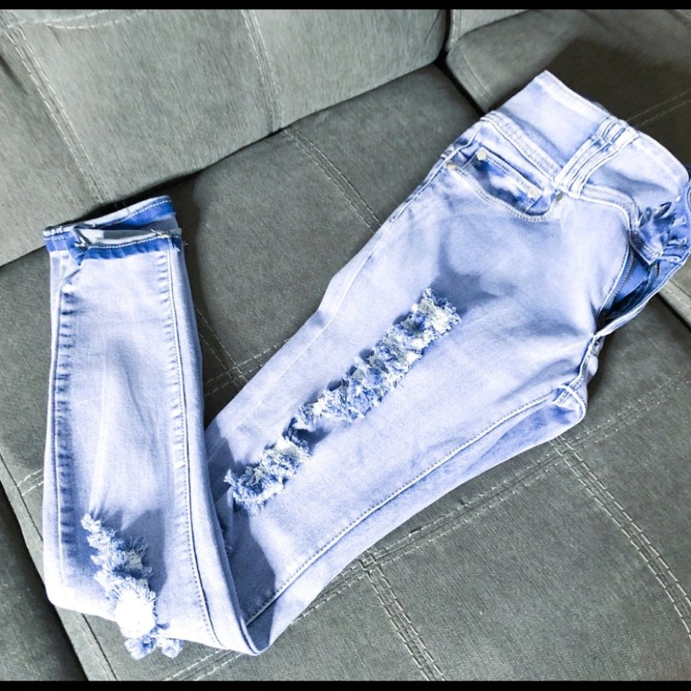 Ripped Light Blue Jeans